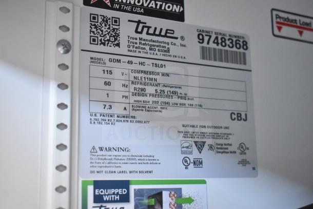 2019 True GDM-49-HC cooler label showing model, voltage 115V, R290 refrigerant info, and warnings.