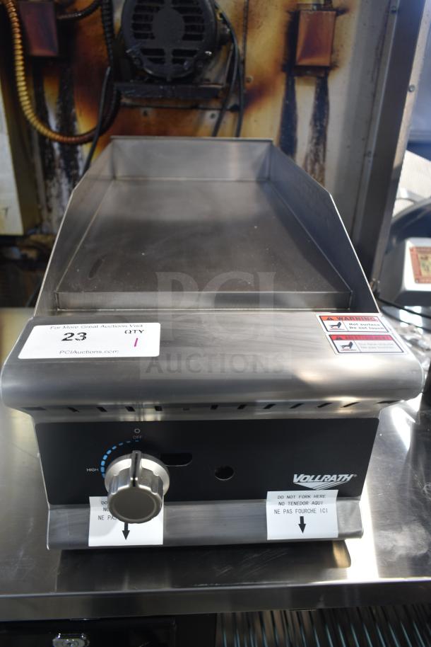 Vollrath GGMDM-12 12" medium-duty griddle, manual controls, 28,000 BTU, with temperature dial, visible caution labels.