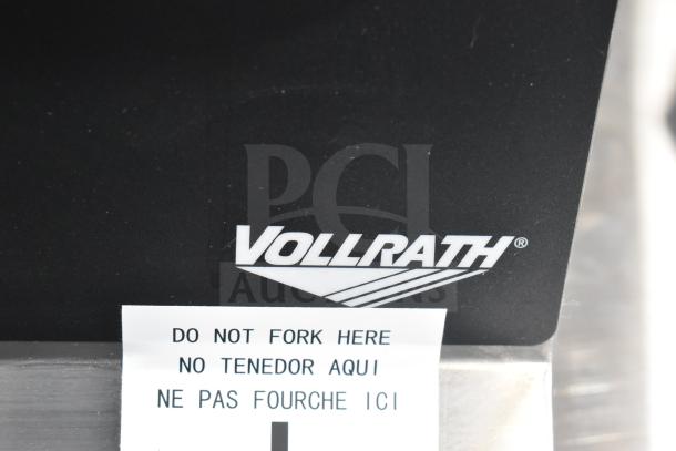 Vollrath GGMDM-12 12" griddle, medium-duty, 28,000 BTU, manual controls, visible "DO NOT FORK HERE" label.