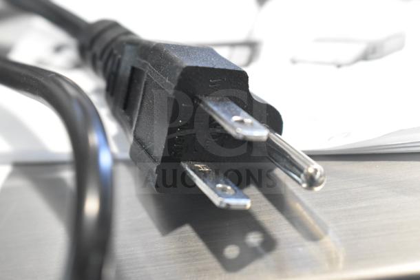 Power cord of AvaWeigh 334PCSP30T scale, detail showing plug type.