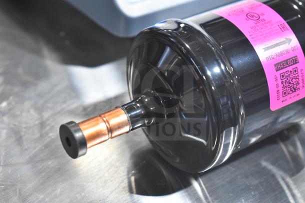 Brand new Sanhua DTG-A08030-002 liquid line filter drier, scratch and dent condition, visible labels with QR code.