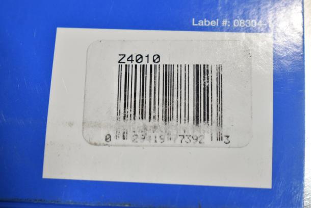 Label close-up showing Vollrath Z4010 model number and barcode on blue packaging for an auction item.