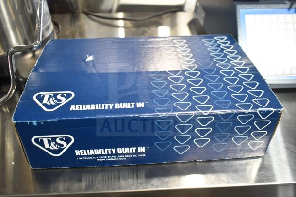 Box of T&S B-0230-CR-LN wall mounted pantry faucet base, new, with scratch and dent, featuring 8" adjustable centers and Cerama cartridges.