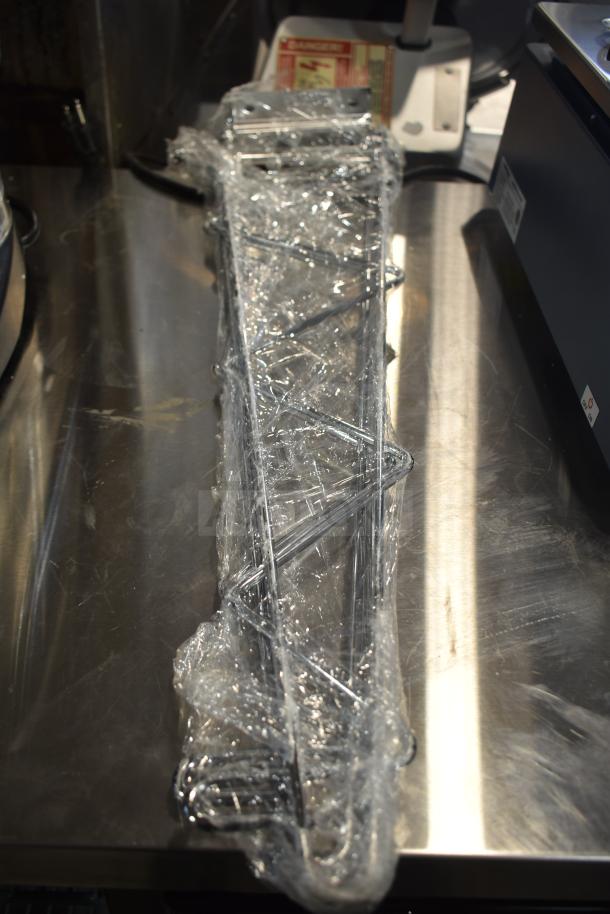 Packaged set of 17 stainless steel flatware holder cylinders, model 176SLDCYLSS, with brackets, new condition.