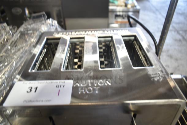 Brand new Avantco 184THD27208 4-slice toaster, wide slots, 208V, 1 phase. Scratch and dent. Auction tag visible.