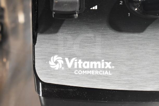 Brand new Vita-Mix VM0101 blender, 2.3 hp, 64 oz container, scratch and dent condition, 120 volts, commercial label visible.