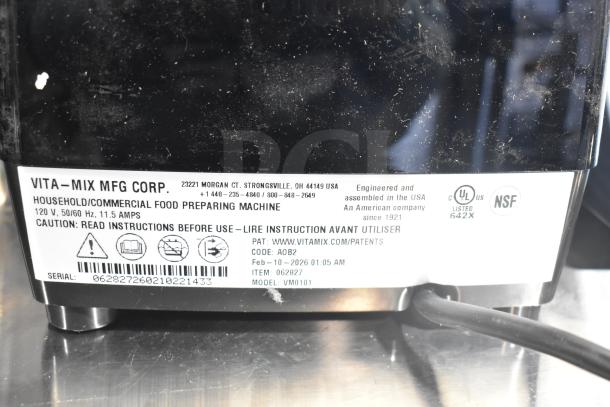 Label on Vita-Mix VM0101 blender, 120V, 2.3 hp, reads "Household/Commercial Food Preparing Machine." Serial and model info shown.