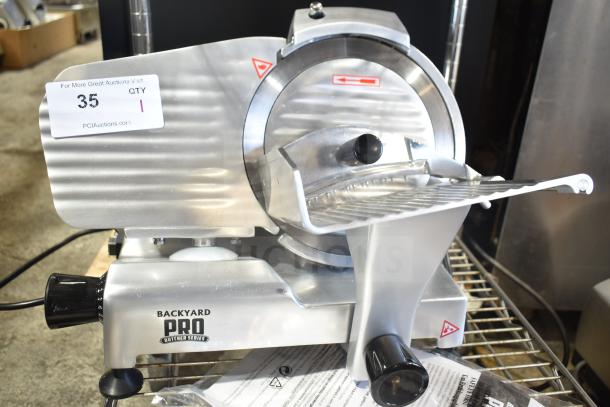 BRAND NEW Backyard Pro MS-106119A meat slicer, 9" blade, manual gravity feed, with sharpener. Scratch and dent condition.