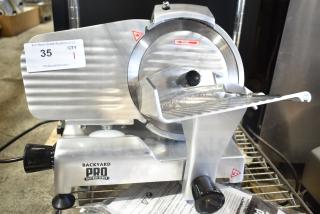 BRAND NEW Backyard Pro MS-106119A meat slicer, 9" blade, manual gravity feed, with sharpener. Scratch and dent condition.