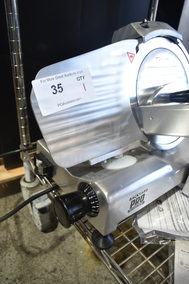 Brand new Backyard Pro MS-106119A 9" meat slicer, scratch and dent model, with blade sharpener. 120V, 1 phase.
