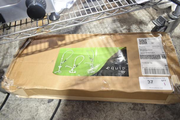 Brand new Equip by T&S 5PR-8W12-C pre-rinse faucet in box, featuring 44" hose, 12 1/8" add-on, and 6" wall bracket.