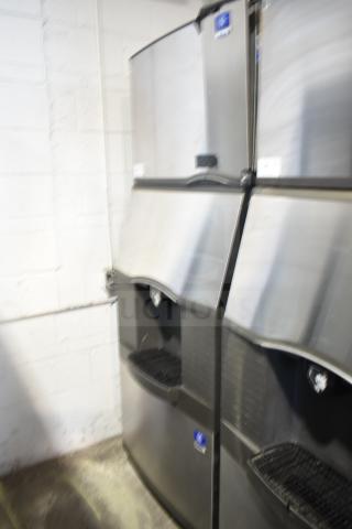 Manitowoc commercial ice machine head on a hotel ice dispenser, 115 volts, 1 phase, stainless steel, used condition.