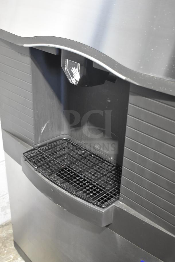 Manitowoc commercial ice machine head on hotel ice dispenser, 115V, 1 phase, stainless steel finish, used condition.