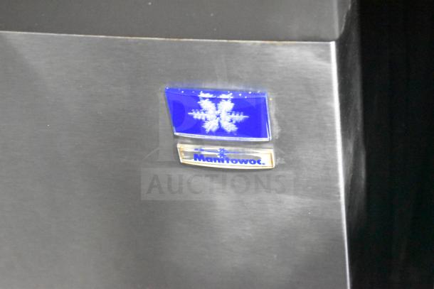 Manitowoc Commercial Ice Machine with logo, 115 Volts, 1 Phase, features hotel ice dispenser. Visible clean steel surface.