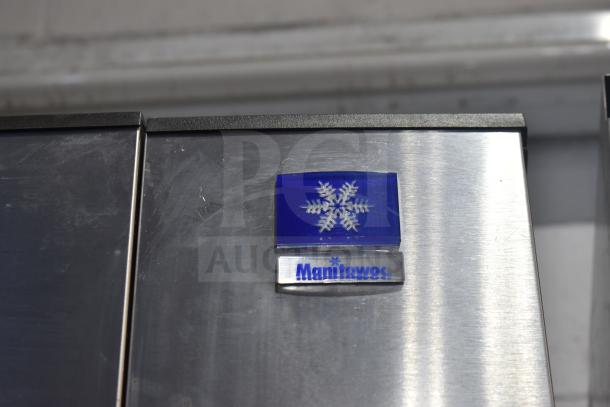 Manitowoc Commercial Ice Machine Head on Hotel Ice Dispenser, 115 Volts, 1 Phase, stainless steel with snowflake logo.