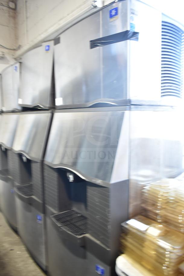 Manitowoc commercial ice machine head on dispenser, 115 volts, 1 phase, stainless steel, in good condition.