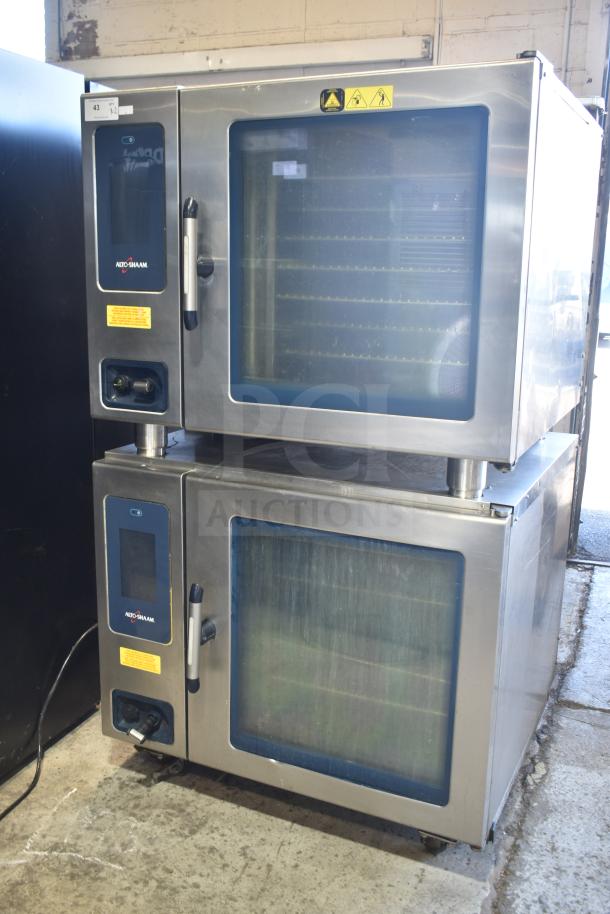 2 Alto Shaam CTP7-20G commercial natural gas combi convection ovens. Both units feature control panels and glass doors.