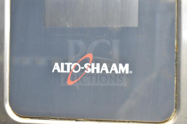 Alto Shaam CTP7-20G combi convection oven door, showing brand logo and control panel.