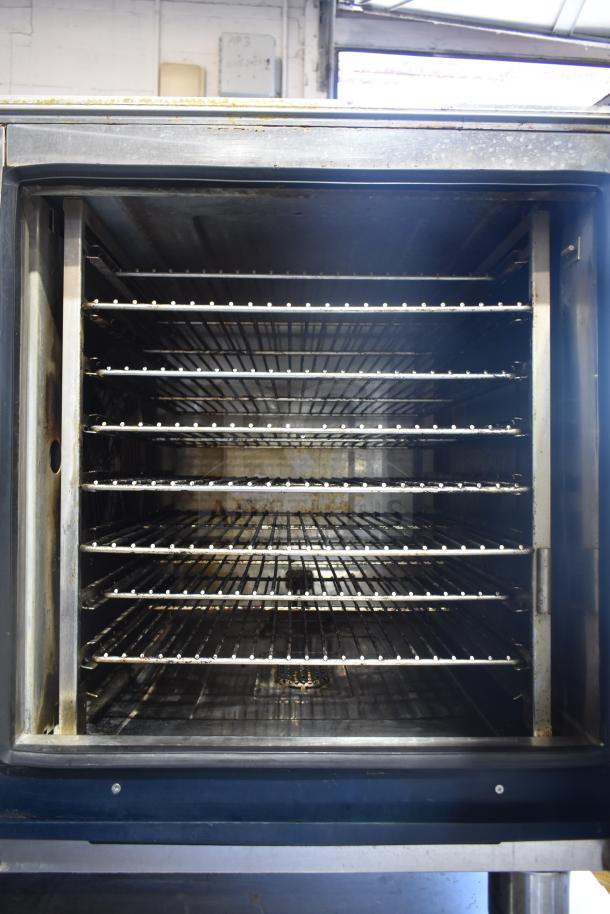 2 Alto Shaam CTP7-20G combi convection ovens, natural gas, spacious interior with multiple racks, commercial use, visible wear.