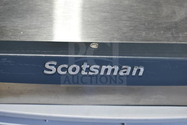 2017 Scotsman C1030SA-32D commercial ice machine head, 208/230 volts, 1 phase. Visible "Scotsman" logo on casing.