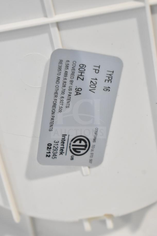Lasko Fan label showing Type 16, 120V, 60Hz, 9A specifications, with patent and safety markings.