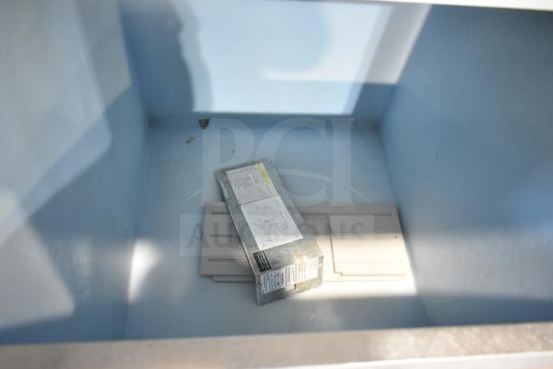 Hoshizaki KML-032-HH commercial ice head on bin interior. Clean, visible labels with wiring diagrams. 208-230V, 1 phase.