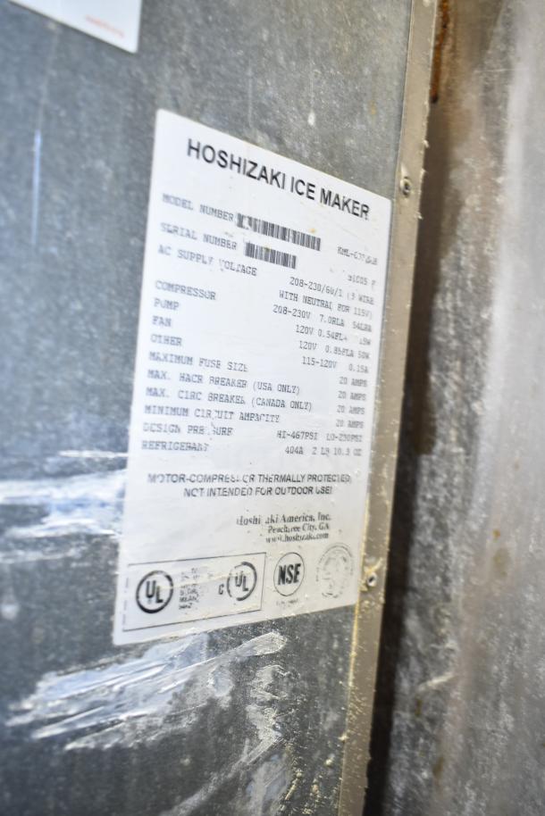 Hoshizaki KML-032-HH Commercial Ice Maker on Bin. Label details voltage 208-230, phase 1, compressor specs. Used condition.