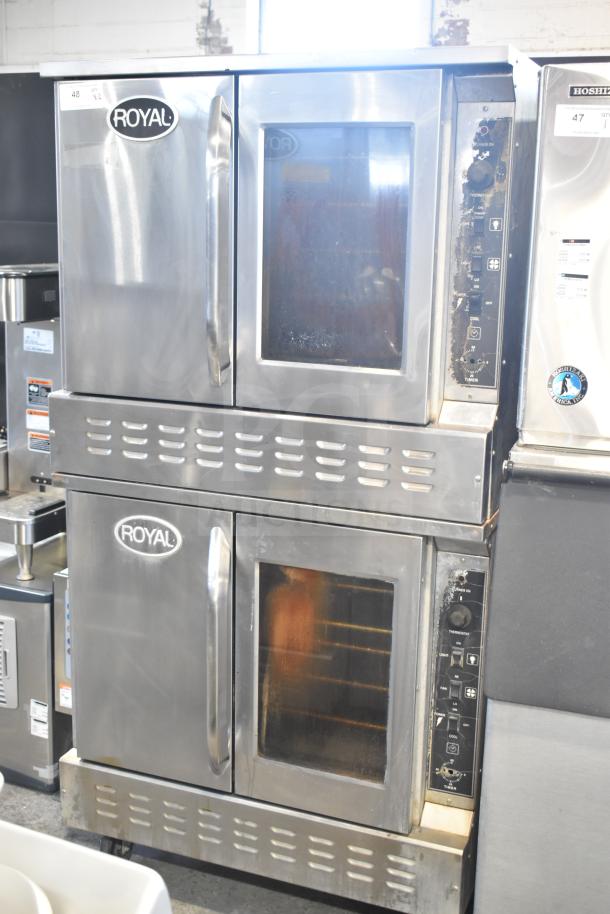Royal commercial full-size convection oven with view-through and solid doors, thermostatic controls, on casters.