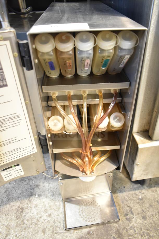 SureShot ACFS-10 flavor dispenser; commercial countertop model, 120V, 1 phase, labeled compartments, well-maintained condition.