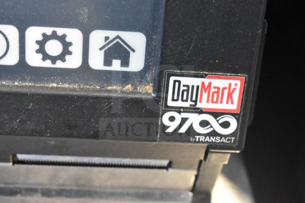 Transact MOD9700 DayMark 9700 receipt printer with visible branding and control icons, showing signs of wear.