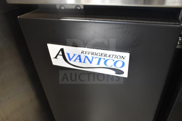 Brand new Avantco 178UBB72GHC black glass door back bar refrigerator, with LED lighting, 115 Volts, 1 Phase.