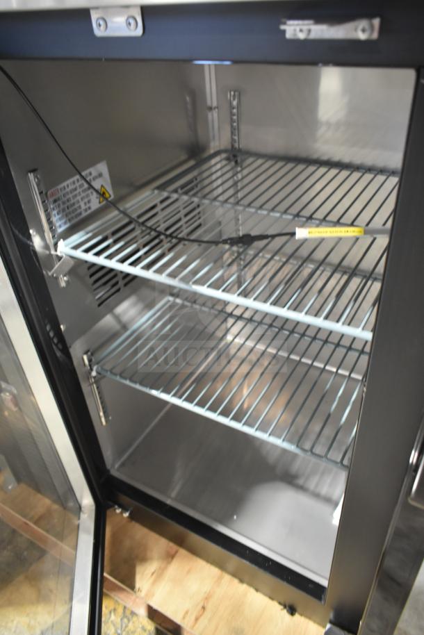 Avantco 178UBB72GHC back bar refrigerator with narrow glass door, LED lighting, and three wire shelves. Brand new, minor scratches.