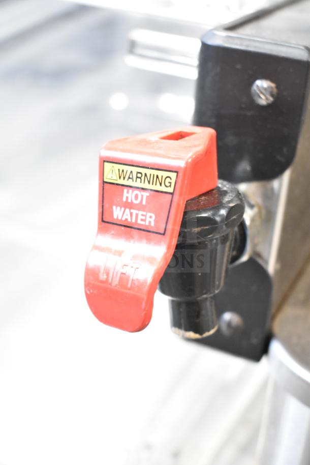 2019 Bunn ICB SH iced tea machine spout with red "Hot Water" warning label, visible black knob.