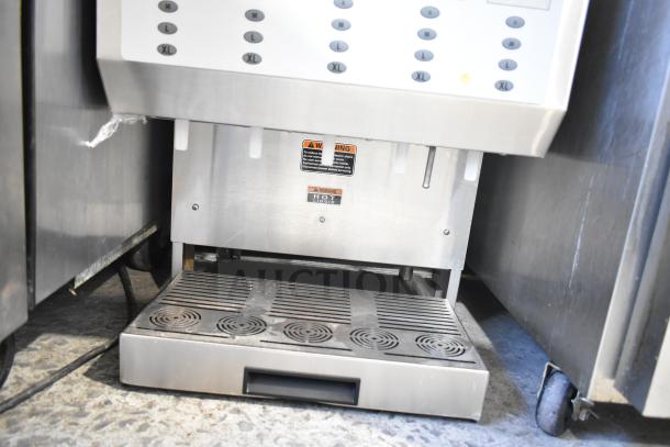 2019 Bunn IMIX-5 cappuccino machine, commercial, 120/208-240V, 1 phase, features multiple size buttons, "Hot" warning label.