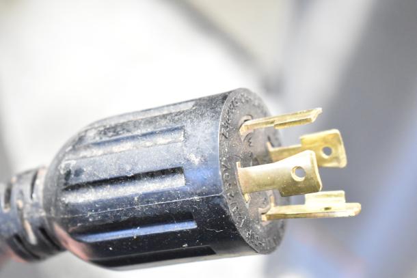 Close-up of power plug for 2019 Bunn IMIX-5 Commercial Cappuccino Machine, showing 120/208-240 volt compatibility.