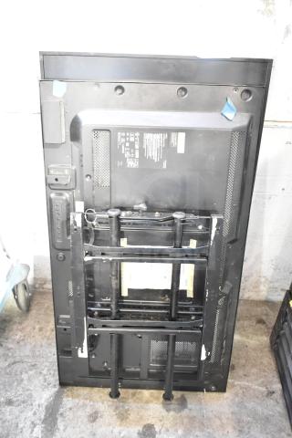 Two NEC V463 televisions, black, shown from the back with mounting brackets attached. Local pickup only.