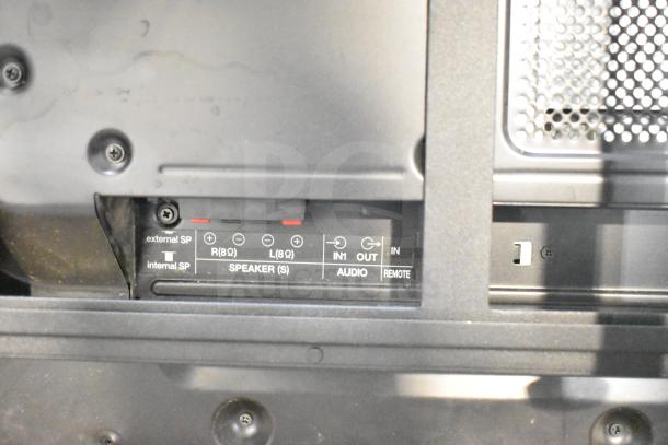 Rear panel of NEC V463 TV, showing audio and speaker connection ports; includes external speaker and remote inputs.