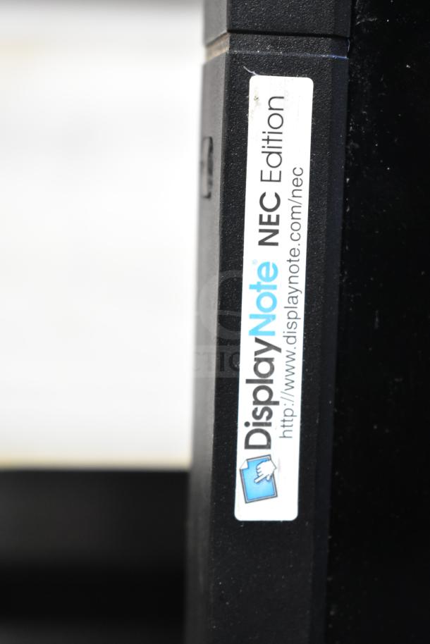 Close-up of NEC V463 television with "DisplayNote NEC Edition" sticker on the frame, showcasing its branding.