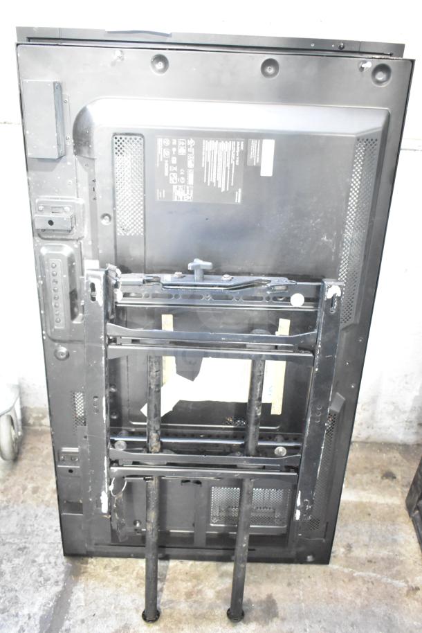 Two NEC V463 televisions, back view. Visible wall mount brackets. Buyer pickup required; no shipping.