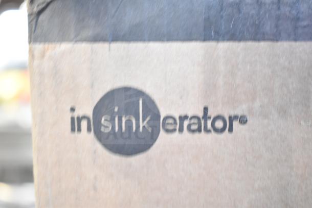 Brand new Insinkerator HWT-00 Instant Hot Water Tank, scratch and dent condition, in original packaging.