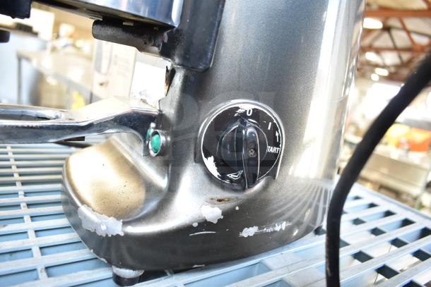 Mazzer Luigi Super Jolly Auto espresso grinder; visible wear; damaged hopper; 220-230V, 1 phase.