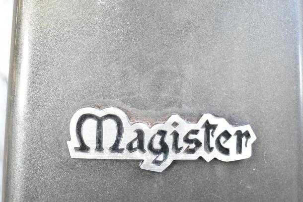 Mazzer Luigi Super Jolly Auto espresso grinder, commercial grade, 220-230V, 1 phase, damaged hopper, "Magister" label visible.