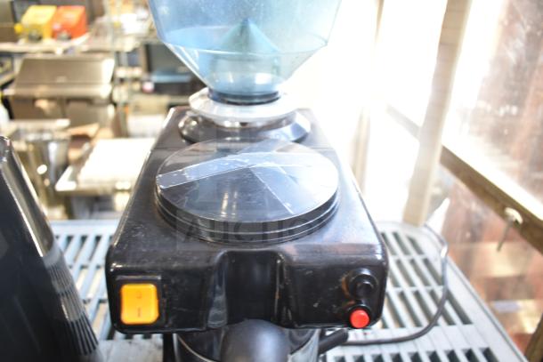 Commercial countertop espresso bean grinder, no lid, 120 volts, 1 phase, black body with control buttons, visible wear.