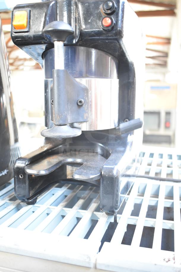 Commercial countertop espresso bean grinder, missing lid. Black and metal finish, working condition, 120 volts, 1 phase.