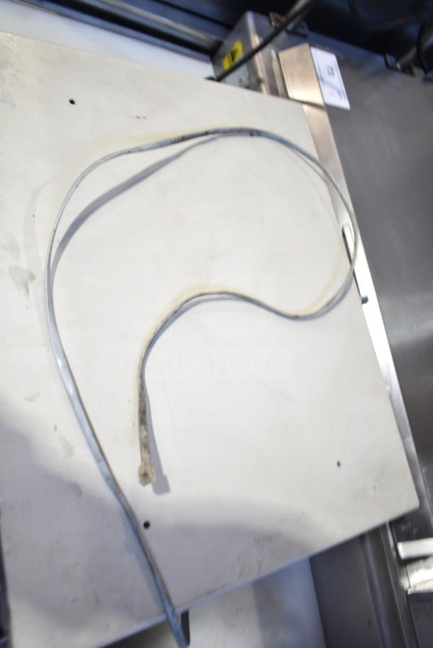 A single cash drawer cable on a white background, part of a lot of five cash drawers for auction.