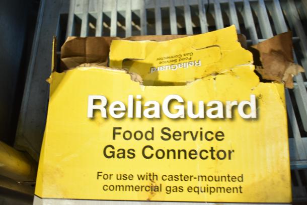 Brand new ReliaGuard RG7548 48" gas connector kit, box damaged, suitable for caster-mounted commercial gas equipment.