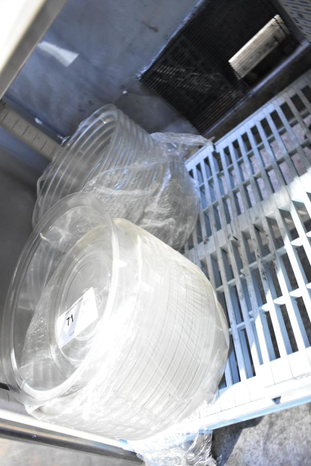 20 clear poly dome covers stacked, wrapped in plastic, excellent condition, label indicates "Lot 71".