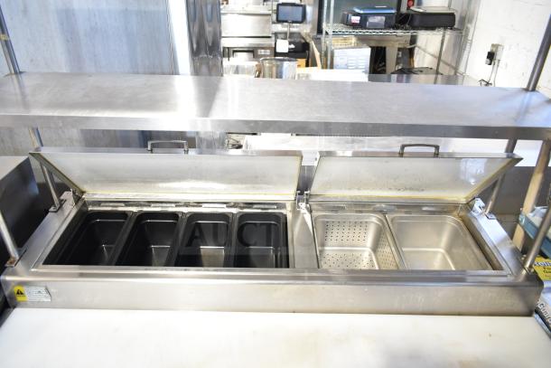 Everest EPPSR2 commercial pizza prep table with two-tier overshelf, visible storage bins, 115 volts, 1 phase, stainless steel.