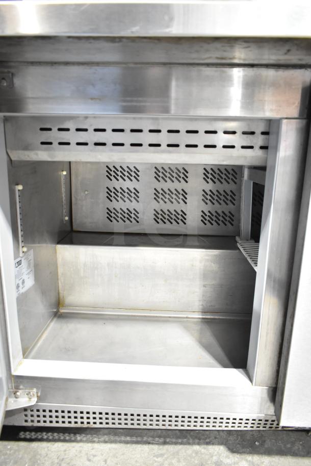 Berg EDMT-72-30 commercial prep table, stainless steel, 115V, 1 phase, interior view showing clean condition.