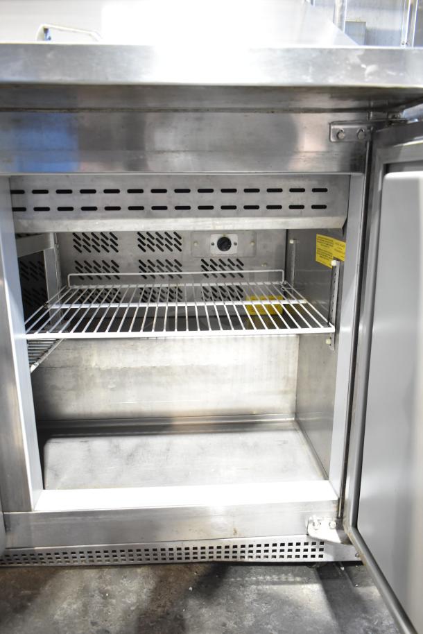 Berg EDMT-72-30 sandwich salad prep table, stainless steel, bain marie mega top, 115V, 1 phase, spacious interior, good condition.